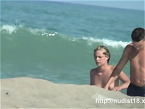 bare beach hidden cam shoots a steamy stunner with a hidden webcam